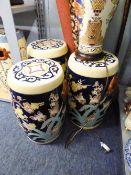 GROUP OF THREE MODERN GARDEN/BARREL SEATS WITH DARK BLUE GROUND AND BAMBOO AND PRUNUS DECORATION,