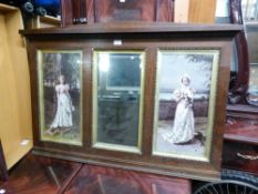 AN OAK FRAMED OVERMANTEL WITH TWO PICTURES OF LADIES, EACH SIDE OF A CENTRAL MIRROR