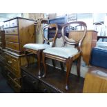 A PAIR OF VICTORIAN MAHOGANY BALLOON BACK SINGLE CHAIRS, ON CABRIOLE FRONT SUPPORTS