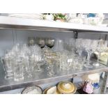 A SELECTION OF CUT AND PLAIN DRINKING GLASSES