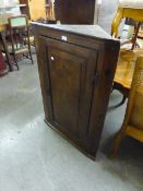 VICTORIAN OAK CORNER CUPBOARD HAVING SOLID PANEL DOOR ENCLOSED THREE SHAPED SHELVES