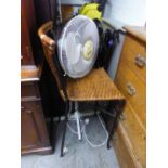 AN ELECTRIC FLOOR STANDING FAN AND A BREAKFAST BAR STOOL WITH WICKER SEAT (2)