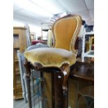 A VICTORIAN WALNUTWOOD FRAMED SPOON BACK LADY'S CHAIR