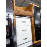A WHITE FINISH BEDSIDE CHEST OF THREE DRAWERS AND A PINK LOOM TUB ARMCHAIR (2)