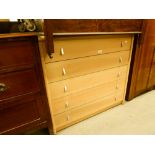 A MODERN BEECHWOOD CHEST OF FIVE LONG DRAWERS