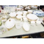 WHITE CHINA EXTENSIVE DINNER AND TEA SERVICE, SUFFICIENT FOR 8 PERSONS, 50 PIECES, HAND DECORATED