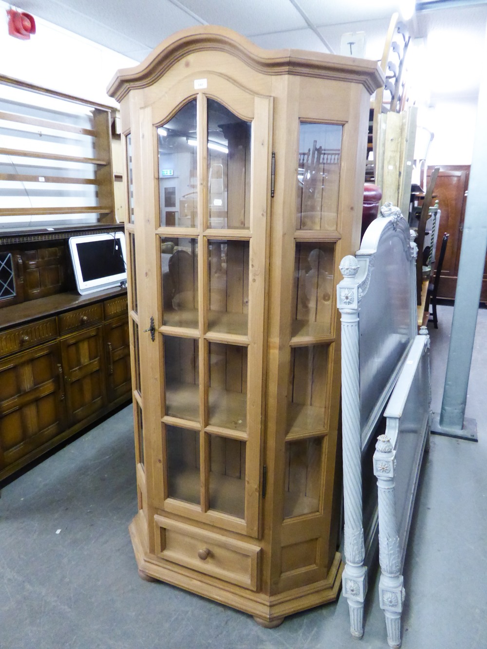 CONTINENTAL PINE TALL ARCH TOPPED DISPLAY CABINET WITH SINGLE PANEL GLAZED DOOR AND GLAZED