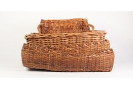 PAIR OF WICKER OBLONG, TWO DIVISION OPEN BASKETS, 8 ½" (21.6cm) high, 22" x 16" (56cm x 40.7cm)