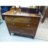 AN EDWARDIAN INLAID MAHOGANY CHEST OF TWO LONG DRAWERS OVER A CUPBOARD BASE