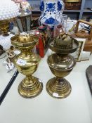 NEAR PAIR OF VICTORIAN BRASS OIL LAMPS, EACH WITH GLASS FUNNEL (2)