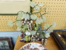 A POST-WAR ORIENTAL CARVED VARI-STONE SCULPTURE OF GRAPES AND VINE LEAVES