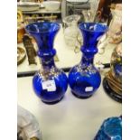 A PAIR OF BOHEMIAN BLUE GLASS VASES OF BALUSTER FORM AND PAINTED FLORAL DECORATION (2)