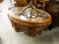 CHINESE PROFUSELY CARVED WOOD OVAL COFFEE TABLE WITH GLASS INSET PROTECTOR, ON CABRIOLE SUPPORTS AND