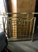 AN ORNATE 3/4 SIZE BRASS BEDSTEAD