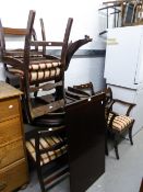 A REPRODUCTION D- END DINING TABLE AND SIX CHAIRS (INCLUDING TWO CARVERS) HAVING STRIPED SILK PAD