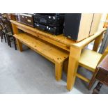 A LARGE PINE EXTENDING DINING TABLE, WITH TWO BENCH SEATS AND A SIMILAR DINING CHAIR (4)