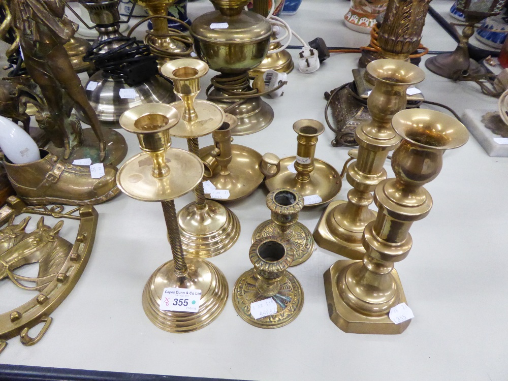 THREE PAIRS OF MID 20th CENTURY BRASS CANDLESTICKS AND TWO CHAMBERSTICK STANDS (8)