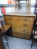 A LATE VICTORIAN OAK CHEST OF DRAWERS