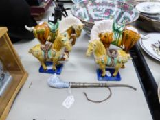 TWO PAIRS OF CHINESE PORCELAIN MODELS OF HORSES WEARING TACK, ON OBLONG BASES, 6 1/2" AND 6" HIGH,