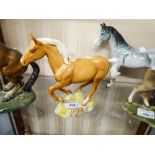 BESWICK MODEL OF A GALLOPING PALAMINO HORSE, No. 1374, 7 1/4" high