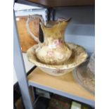 TOILET JUG AND BOWL, DECORATED WITH FLOWERS ON A CREAM GROUND