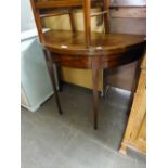 EARLY NINETEENTH CENTURY LINE INLAID MAHOGANY DEMI-LUNE FOLD OVER TEA TABLE, raised on square,