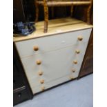 A MODERN LIGHT OAK AND REAM FRONTED CHEST OF FOUR LONG DRAWERS