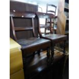 A PAIR OF ANTIQUE DINING CHAIRS, WITH PANEL SEATS