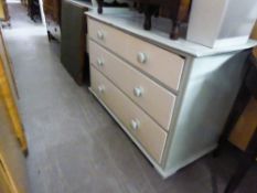 A VICTORIAN PAINTED PINE CHEST OF THREE LONG DRAWERS