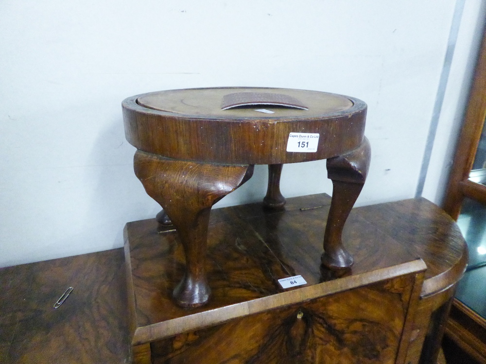 a MAHOGANY CIRCULAR LOW JARDINIERE STAND, on four cabriole legs