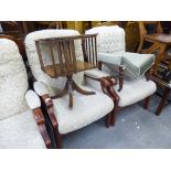 A PAIR OF ERCOL STYLE ELM WINGED FIRESIDE ARMCHAIRS, UPHOLSTERED AND COVERED IN LEAF SCROLL EMBOSSED