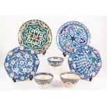 PAIR OF IZNIK INSPIRED MODERN TURKISH POTTERY PLATES, of octagonal outline, floral painted and