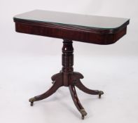 REGENCY MAHOGANY PEDESTAL FOLD-OVER TEA TABLE, with D shaped top, heavy ring turned column and
