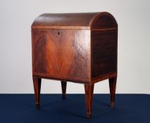 GEORGE III FLAME CUT MAHOGANY AND KINGWOOD CROSSBANDED DOME TOP CELLARETTE, the plain interior