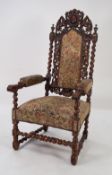 NINETEENTH CENTURY FRENCH CARVED WALNUT AND BEECH LARGE OPEN ARMCHAIR OR THRONE CHAIR, the high back