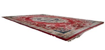 LARGE WASHED CHINESE CARPET OF FRENCH DESIGN, having a very large circular and shaped centre