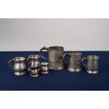 TWO VICTORIAN PEWTER 'GILL' BELLY MEASURES, 3" high, TWO SIMILAR SMALLER MEASURES, 2" high;