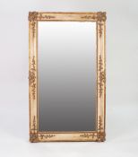 EARLY 20th CENTURY BEVELLED MIRROR IN PAINTED AND PARCEL GILDED GESSO FRAME, 32 1/2" x 55 1/2" (82.5