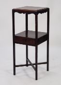 EARLY NINETEENTH CENTURY MAHOGANY WASHSTAND, the moulded square top above a shaped frieze and open