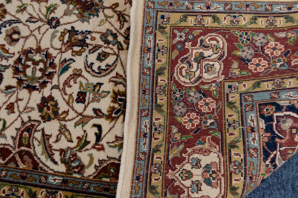 A MODERN PERSIAN WOOL PILE RUG, the cream field with a central medallion surrounded with stylized - Image 3 of 3