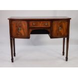 'MAPLE', GEORGIAN STYLE FIGURED AND CROSSBANDED MAHOGANY BOW FRONTED SMALL SIDEBOARD, the shaped