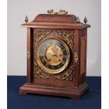 LATE NINETEENTH/ EARLY TWENTIETH CENTURY MANTLE CLOCK IN LATER MAHOGANY CASE, the 6" Roman black and