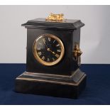 LATE NINETEENTH CENTURY BLACK SLATE AND GILT METAL MANTLE CLOCK, the 4" Roman dial, indistinctly