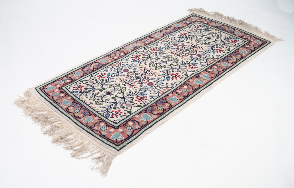 MODERN TUNISIAN WOOL PILE RUG, in Persian taste with fringed ends, 58" x 28" (147 x 71cm)