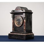 LATE 19th CENTURY BLACK SLATE AND VEINED MARBLE MANTEL CLOCK, the French movement striking on coiled