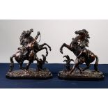 AFTER NICOLAS COUSTOU (1658-1733), PAIR OF PATINATED BRONZE GROUPS OF THE MARLY HORSES, each