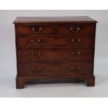 GEORGE III MAHOGANY CHEST OF DRAWERS, the moulded oblong top above two short and three long