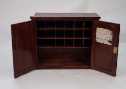 VICTORIAN MAHOGANY TWO DOOR MURAL CABINET, the shaped oblong top, with cut-out to left side, set