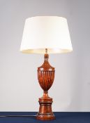 CARVED AND TURNED WALNUT TABLE LAMP, of slender lidded urn form with turned pedestal base and the