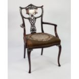 EDWARDIAN INLAID AND CARVED MAHOGANY DRAWING ROOM OPEN ARMCHAIR, the scrollwork back with pierced